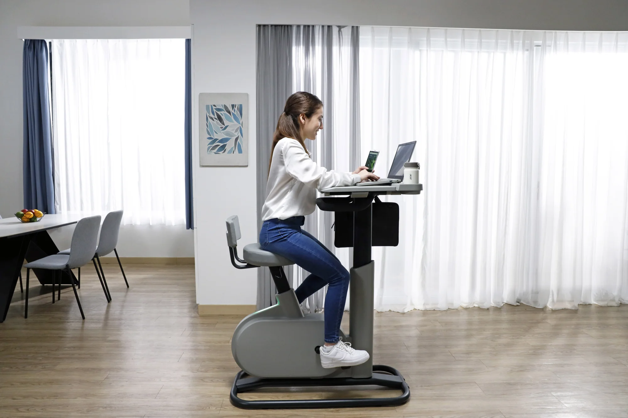 Exercise Bike/Work Desk Combo Allows you to Charge Your Devices